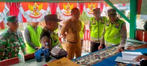 Sat Binmas Polres Banyuasin Lakukan Penilaian Pos Kamling di RT 09 Desa Lubuk Lancang