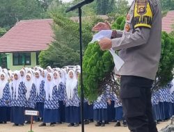 Bhabinkamtibmas Polsek Indralaya Jadi Pembina Upacara di MTsN 1 Sakatiga 