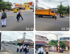 GIAT STRONG POINT, PENGATURAN LALIN DI SIMPANG SMA LINGUA PRIMA DAN SMPN 1 INDRALAYA SERTA SD N 11 INDRALAYA
