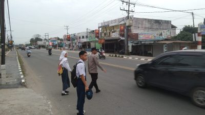 Pelantikan Keselamatan Pelajar Polsek Indralaya Laksanakan Pengaturan Lalu Lintas Di Simpang