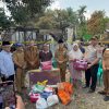 Dampingi Wakil Bupati Ogan Ilir, Kapolsek Tanjung Raja Tinjau Lokasi Kebakaran di Desa Sungai Pinang II