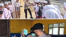 Peduli Kesehatan Pelajar, Dan Pengguna Jalan, Polsek Tanjung Batu Bagikan 150 Masker kepada Siswa SD Negeri 16 Serta Warga Yang Melintas